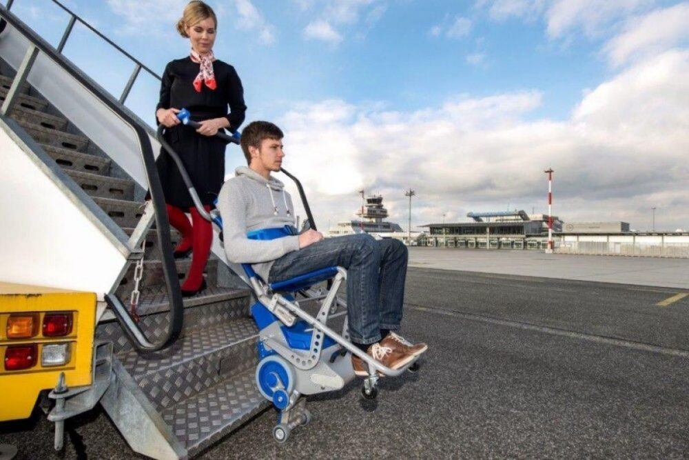 Kolečkový schodolez, zvláštní pomůcka, přeprava imobilních osob, jako invalidní vozík, bezbariérový