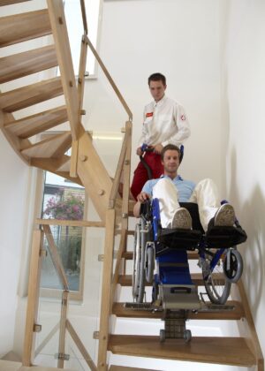 Kolečkový schodolez, zvláštní pomůcka, přeprava imobilních osob, jako invalidní vozík, bezbariérový